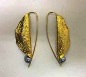 Hand Wrougnt 24k gold earrings made with black pearl by Goldsmith Ruth Rhoten