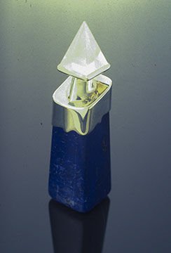 Pure rock quartz prymid set over mother of pearl,60% cut pyramid, sterling silver, set with 18k gold rivets, lazis lazuli