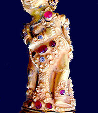divi with rubies and other stones