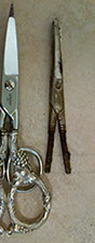 Cast new silver handles and ground stainless steel to fit new handles.