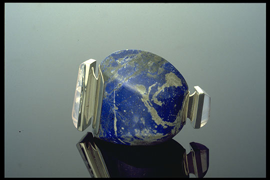 Lapiz Lazuli, purple rose quartz, with sterling settings and gold rivets. 