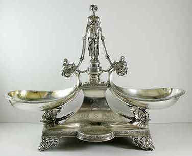 Coin Silver Center piece made in San Francisco. Trade mark is shown and Ruth Rhoten repairing tilt of female figure.